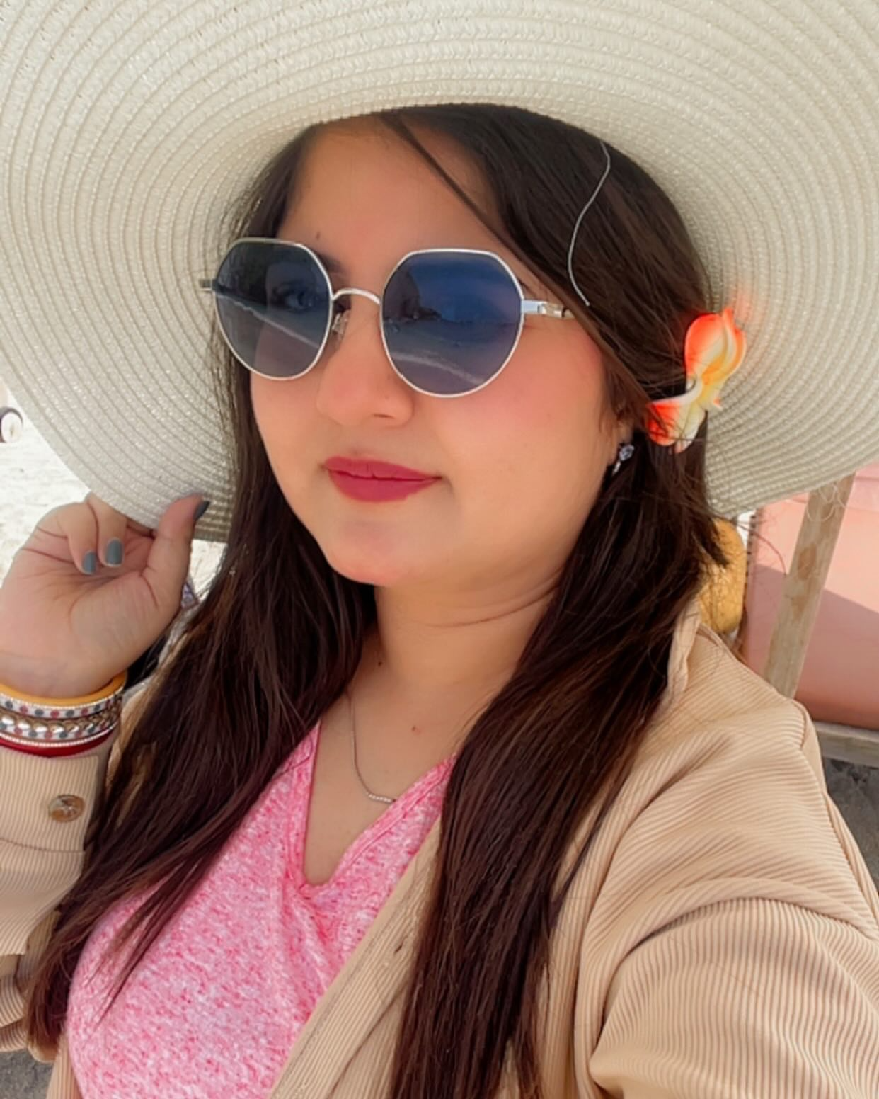 Hanisha Sachdeva wearing a sun hat
